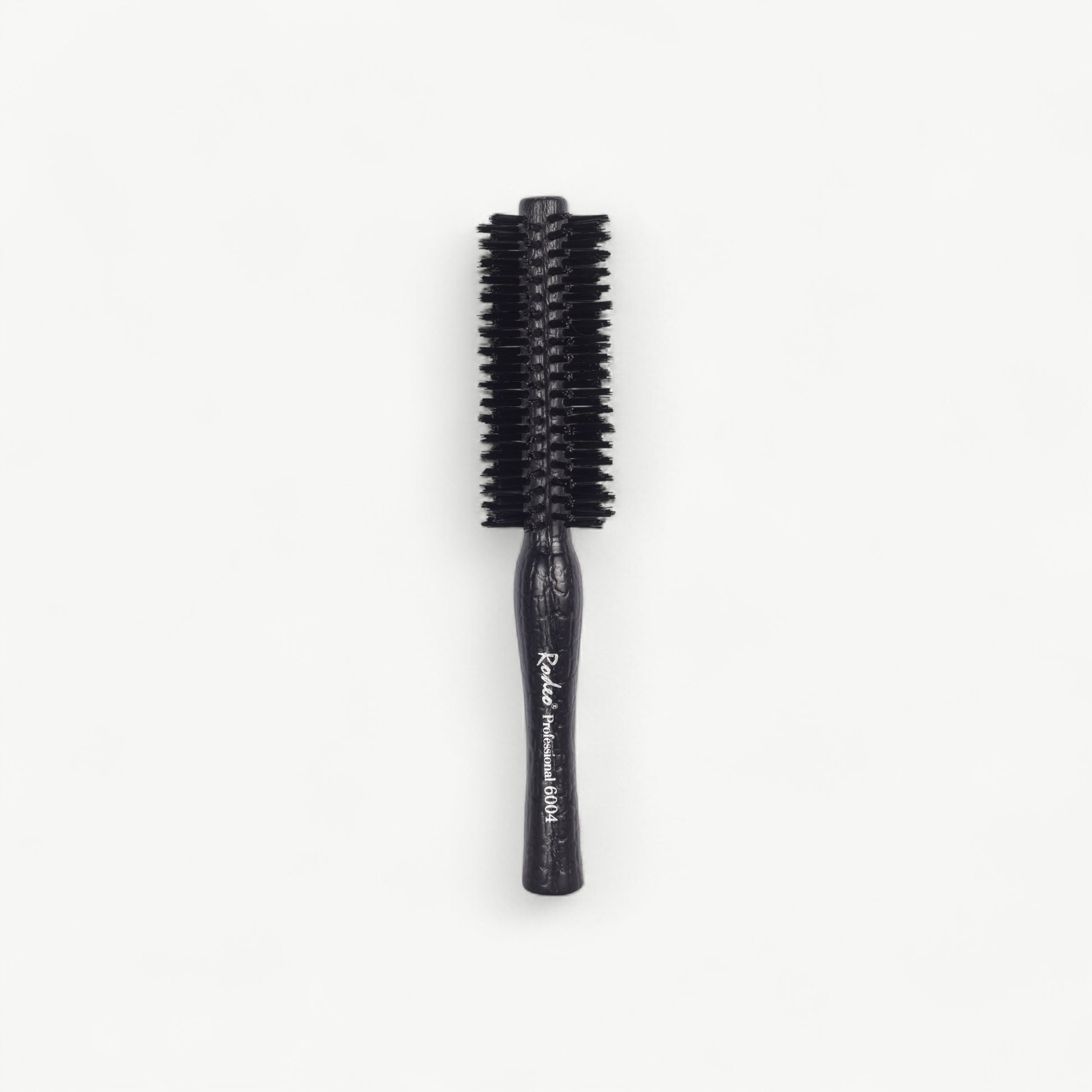 Professional Rodeo styling brush for blow-drying, shaping and controlled salon finishing.