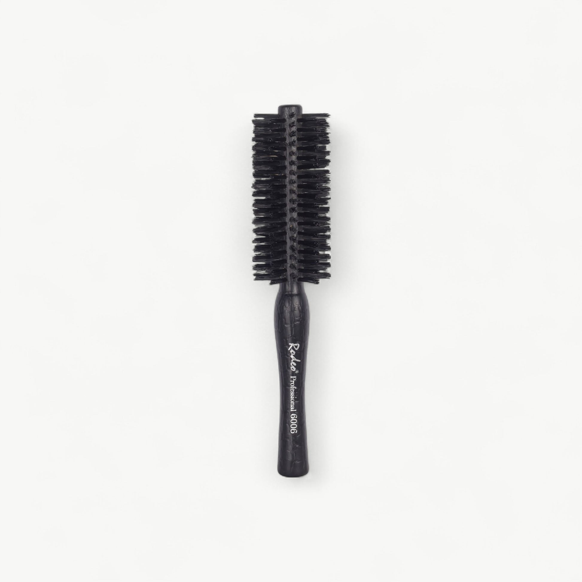 Professional Rodeo styling brush for blow-drying, shaping and controlled salon finishing.