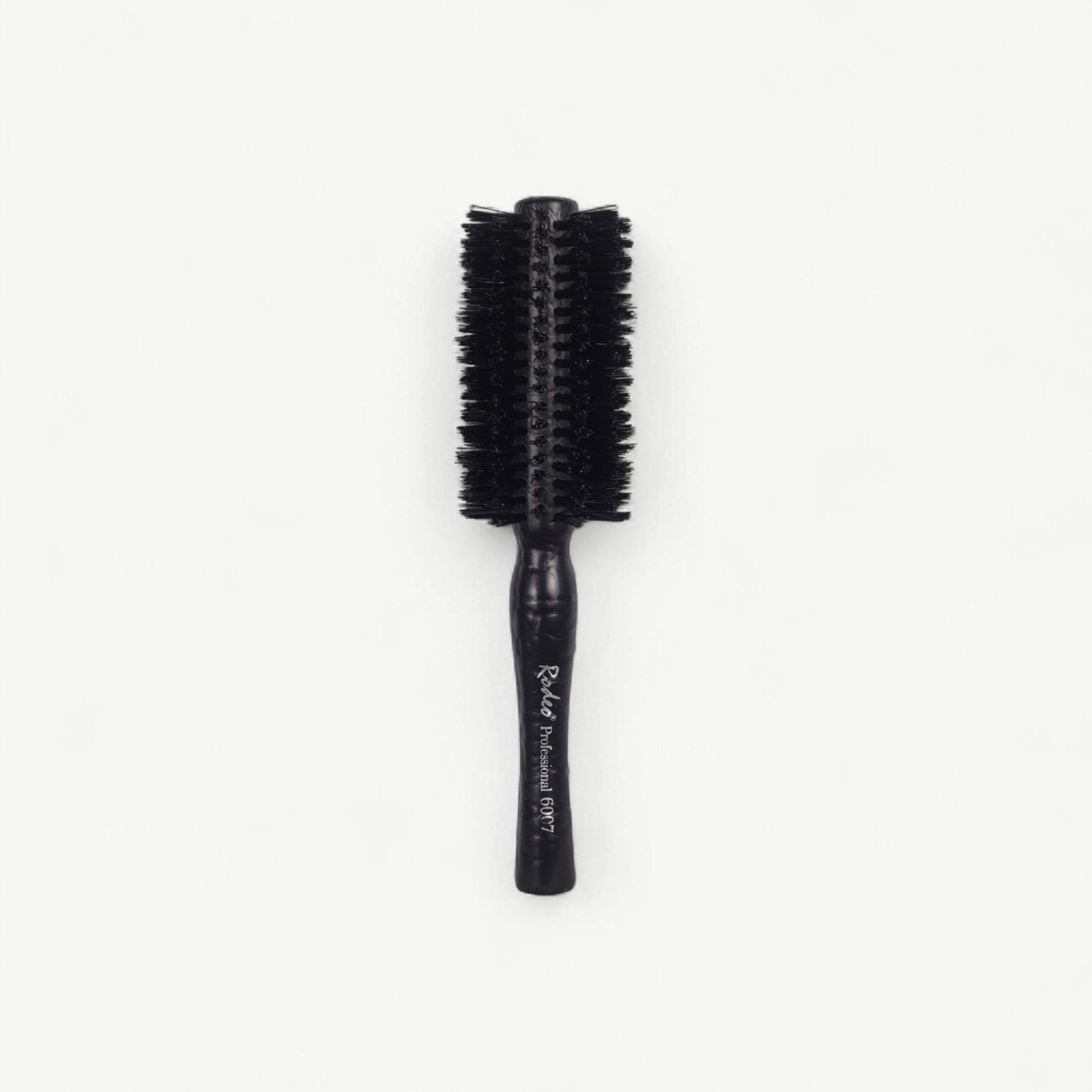 Professional Rodeo styling brush for blow-drying, shaping and controlled salon finishing.