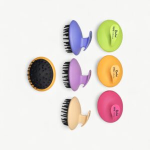 Professional hair and scalp massage brush for cleansing, detangling and stimulating massage routines.
