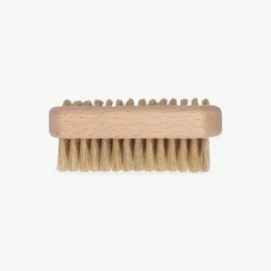 Professional nail-cleaning brush for salon, barber and personal grooming routines.