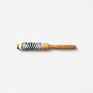 Professional 36mm ceramic radial blow-dry brush with a wooden handle for smooth, controlled styling.